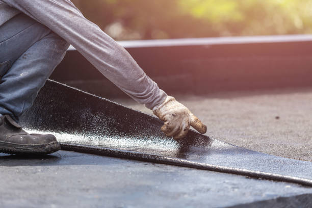 Professional Basement Waterproofing technician working in Greenville, GA